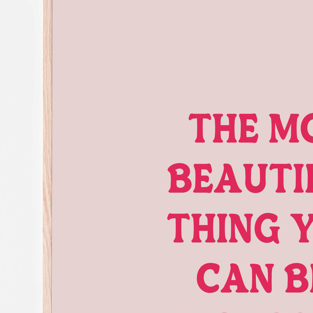 The most beautiful thing you can be is yourself art print - quote from barbie movie with pink background and dark pink lettering