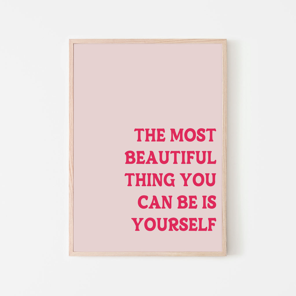 The most beautiful thing you can be is yourself art print - quote from barbie movie with pink background and dark pink lettering