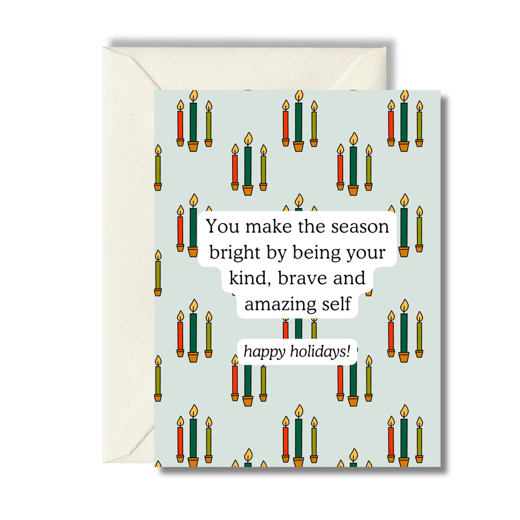 A modern Christmas card with three Christmas candle sticks and an inspirational message that reads: "You make the season bright by being your kind, brave and amazing self. Happy holidays!"