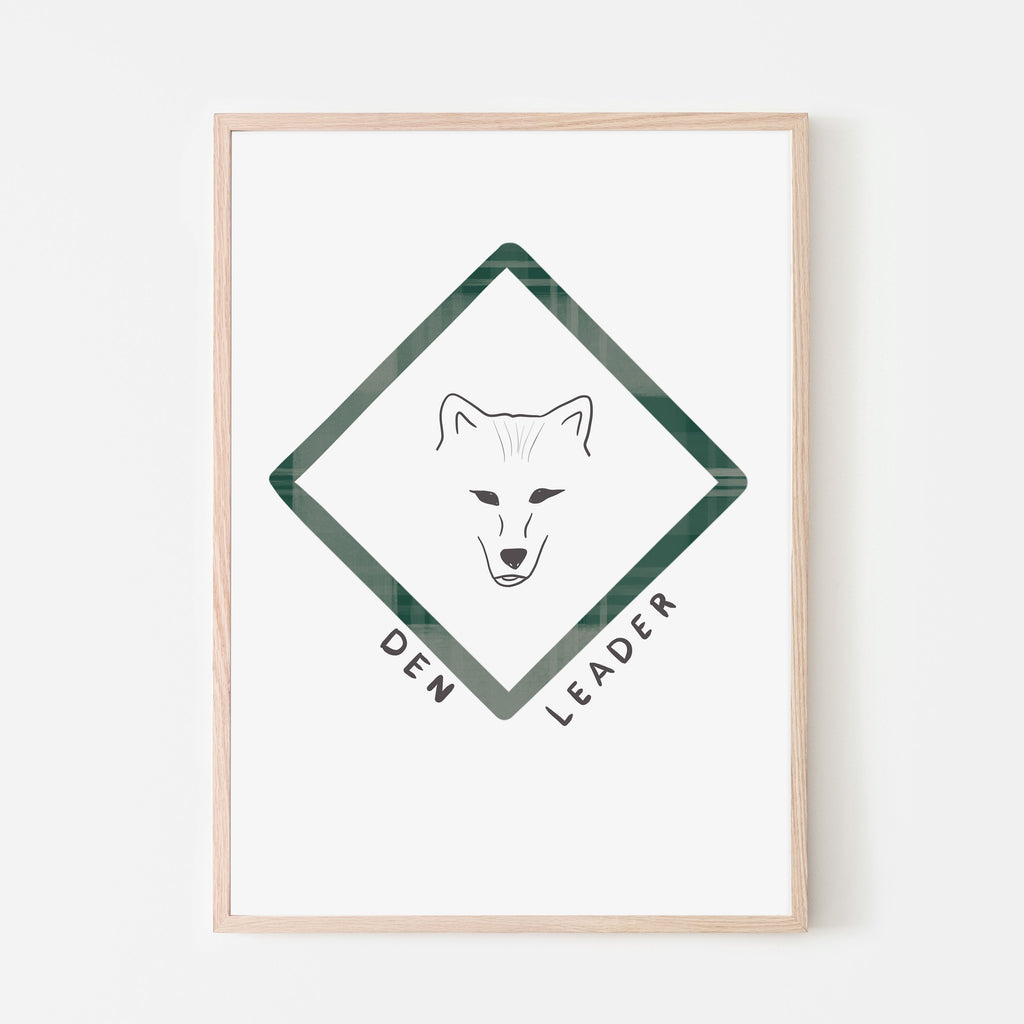 A drawing of a fox with a green triangle around it. The words 'den leader' are underneath and it is on a white background with a wood frame. This print is designed to go in a baby room, nursery, kids bedroom, playroom, classroom, or daycare center. Gift idea.