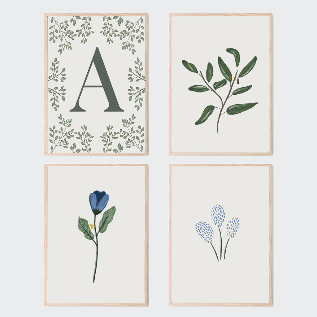 set of four flowers and foliage theme art prints, first print is bold dark green letter surrounded by foliage, second print is dainty three blue flowers on green stems, third print is foliage leaves with small cocoon and fourth print is blue flower with green stem and small yellow butterfly; baby shower gift idea, floral nursery theme, baby boy nursery, baby girl nursery, kids bedroom, kids playroom, boys, girls