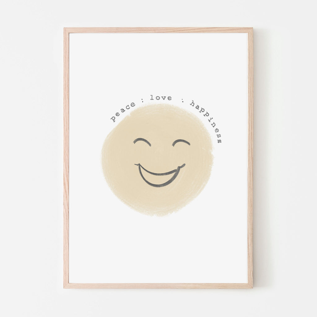 Yellow smiling face with the words peace love and happiness written above it with a white background
