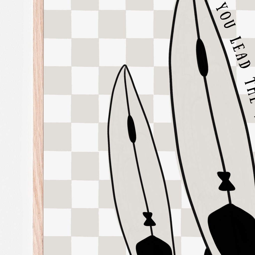 Daddy and child surfboard art print with cream and white checkered background and inspirational quote "you lead the way little grom" to inspire parents to allow their child's imagination to take over and the parent follows the kid
