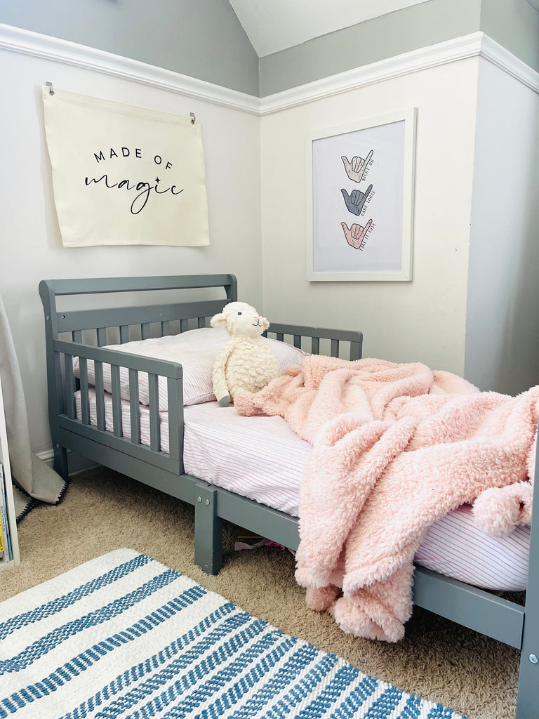 Made of magic canvas banner in toddler girl bedroom
