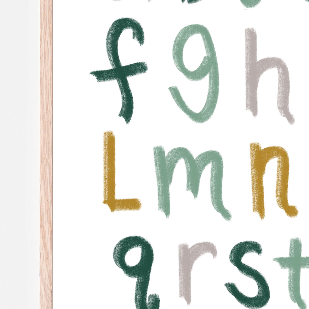 CLose up image of Woodland toned alphabet letters in grey, greens and mustard yellows with white background. gift idea, nursery print, gift for new mom